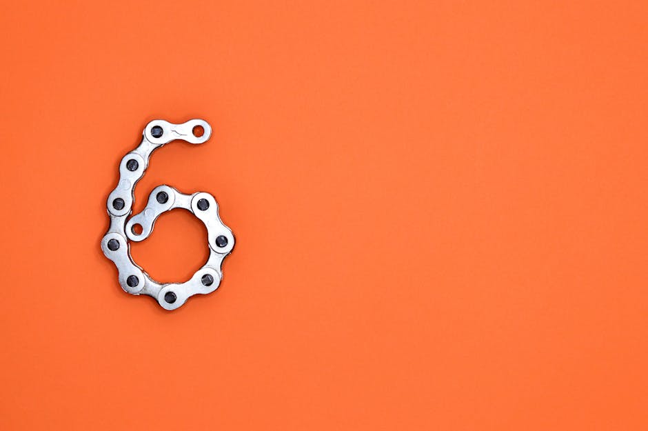 Metal chain shaped as number six representing connectivity