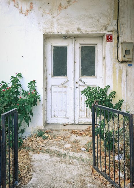 White door with red number six sign